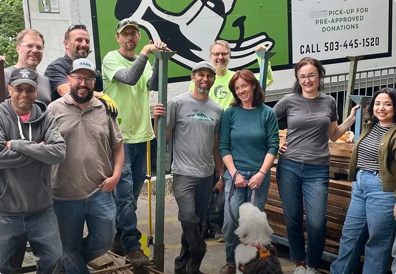 The Green Hammer Team gathered for a team photo at the Rebuilding Center in Portland, OR.