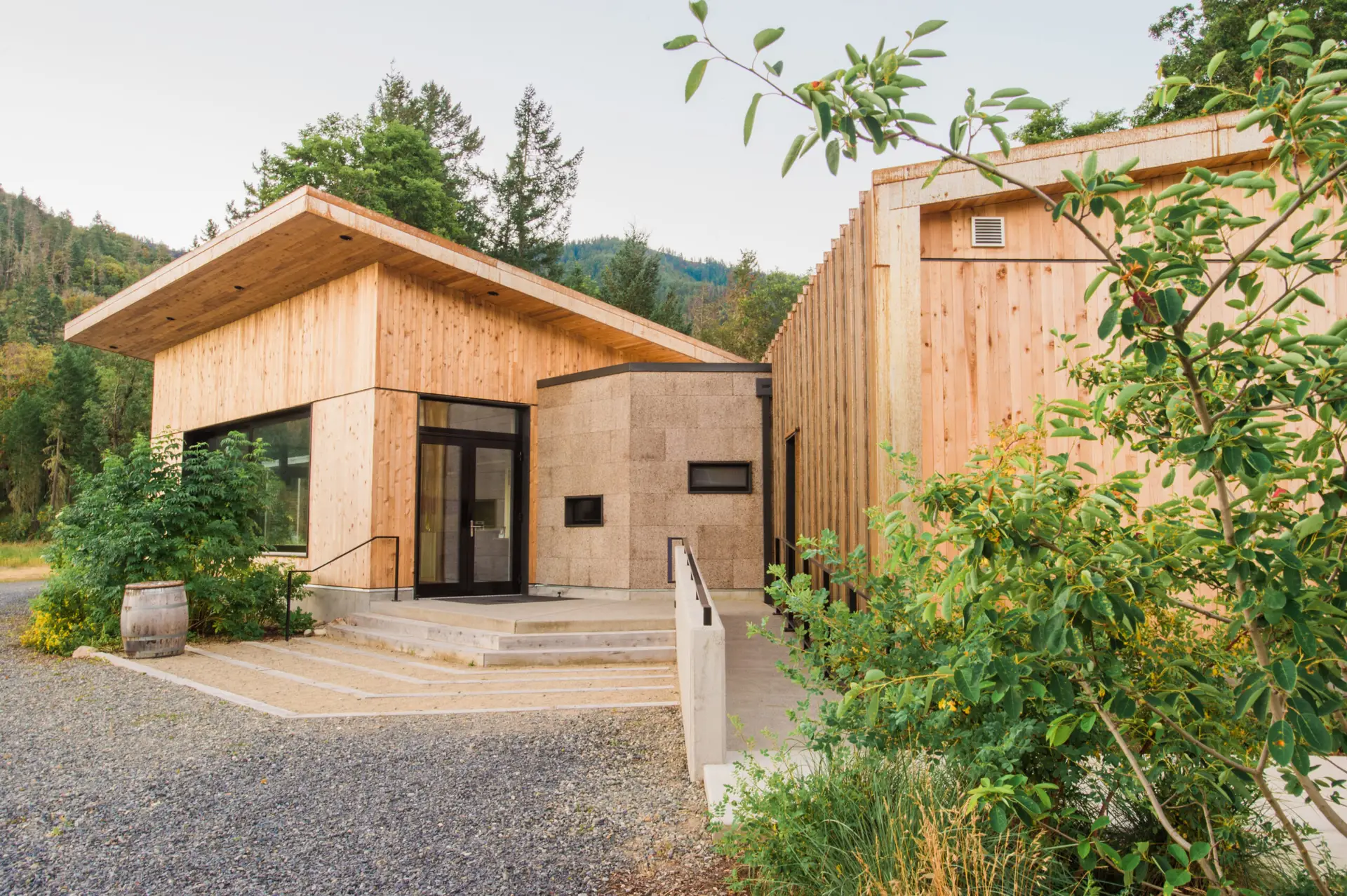 Cowhorn Vineyard and Garden exterior showing wood cladding, cork cladding and metal panel