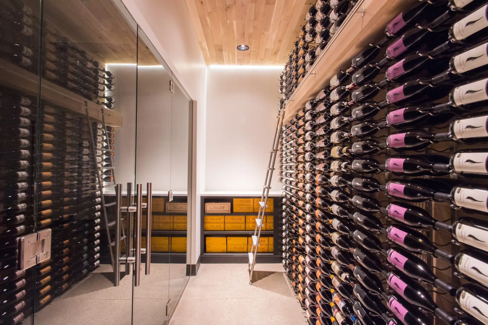 Interior shot showing wine storage area and glass doors