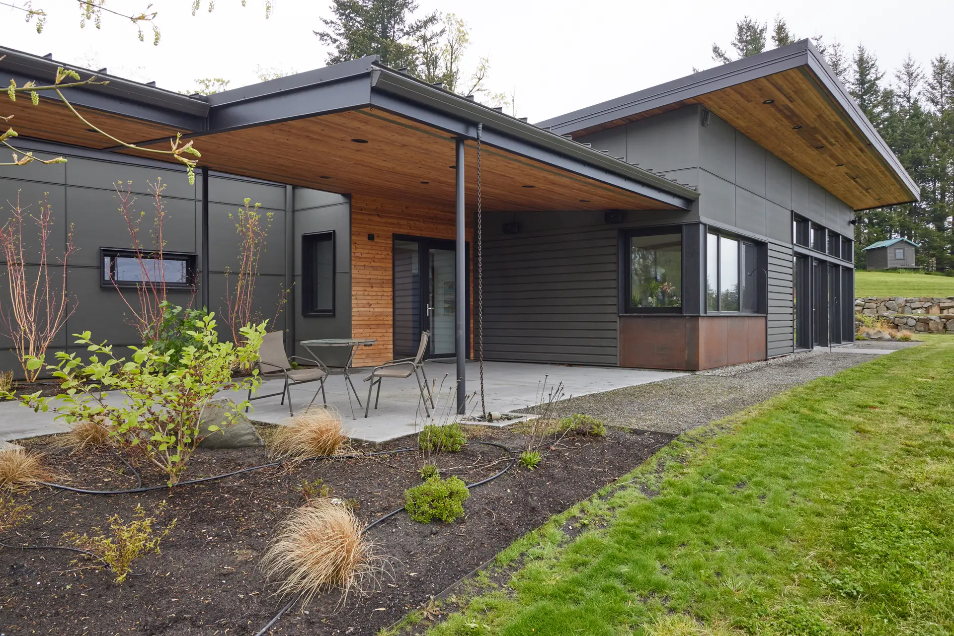Corbett Residence exterior detail showing the covered porch and wood sofits.