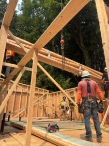 Trusses being craned into a job site in Portland, Oregon